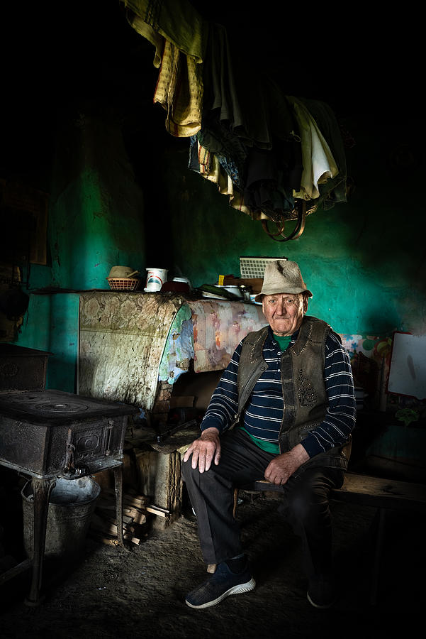 The Old Man And The Fireplace Photograph by Bruno Lavi