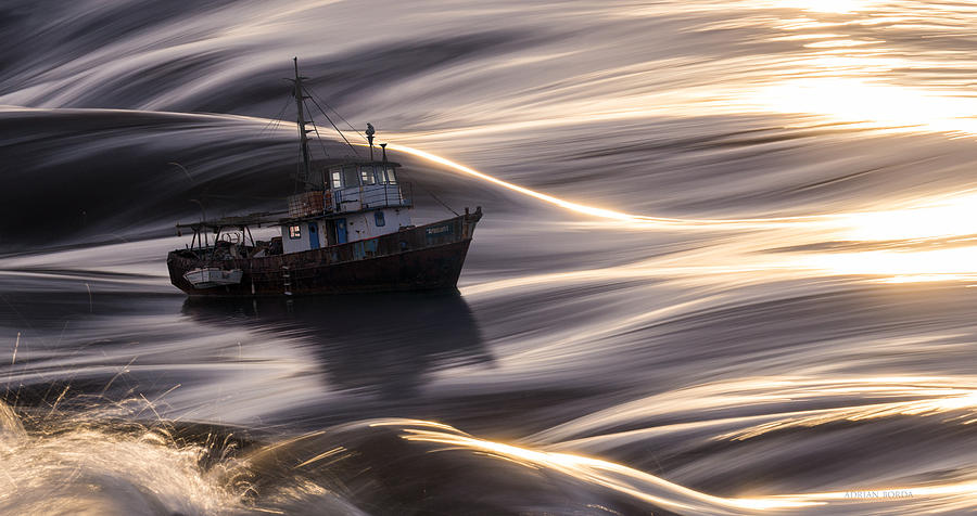 The old ship and the sea Photograph by Adrian Borda