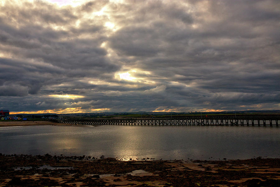 The Pier At Amble On A Cloudy Evening Photograph by Jeff Townsend