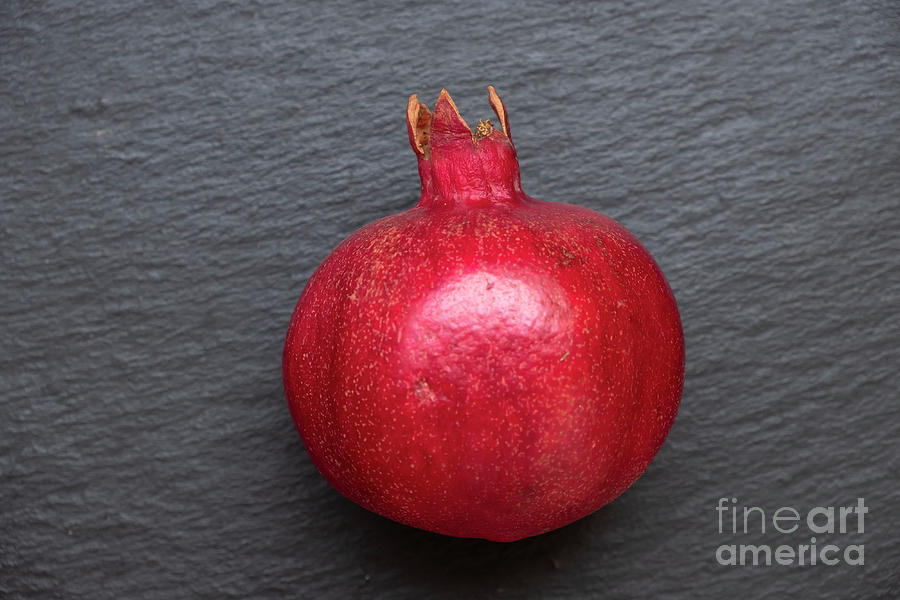 The pomegranate fruit Photograph by Marina Usmanskaya