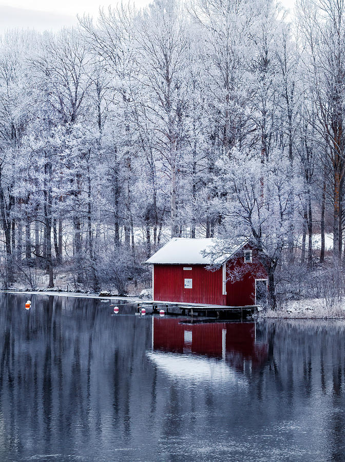 Winter Photograph - The Red Boathouse By A Cold Canal by Christian Lindsten