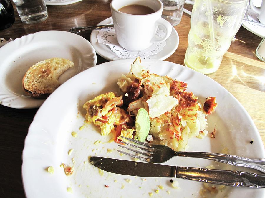 The Remains Of Breakfast On A Plate Photograph by William Boch