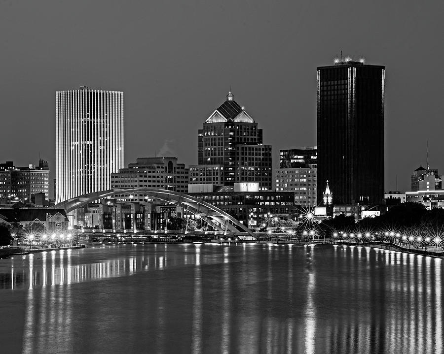 The Rochester Skyline reflecting the the Genesee River Rochester NY Blue Building Black and White Photograph by Toby McGuire