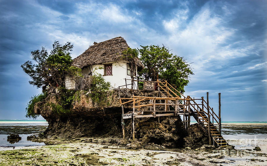 Picturesque house on a tropical coral outcrop Photograph by Lyl Dil Creations