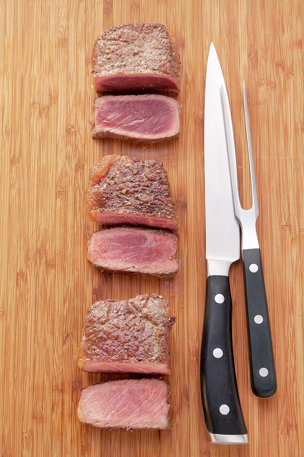 The Stages Of Cooking Steak raw, Rare, Pink, Well Done Photograph by Eising Studio
