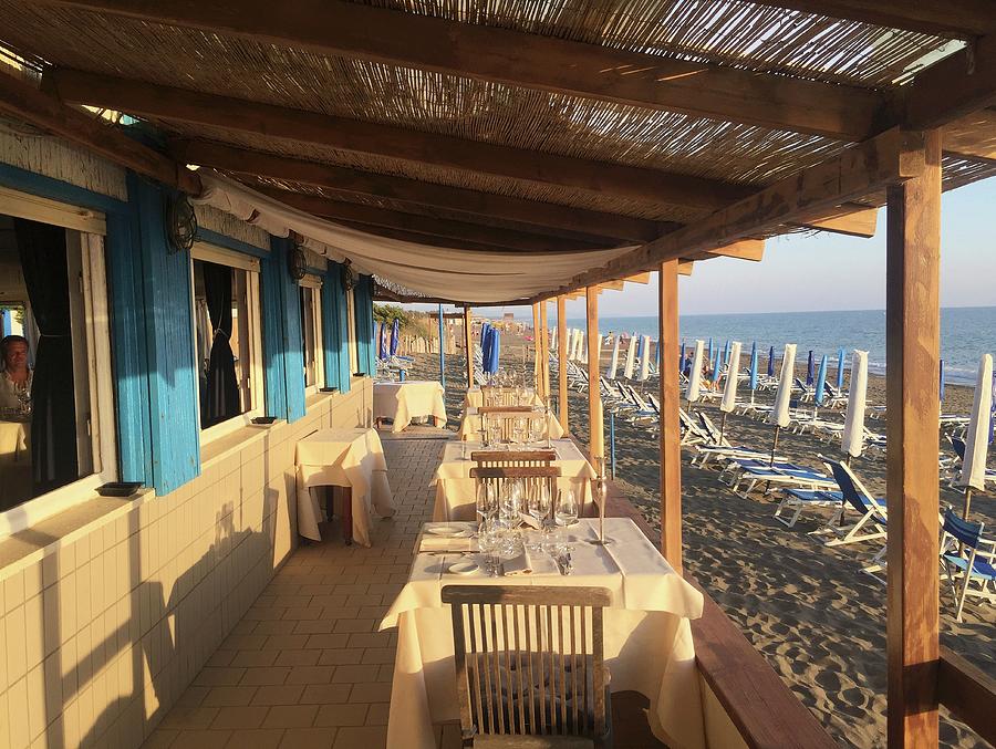 The Sunny Terrace Of A Beach Restaurant Photograph by Hugh Johnson