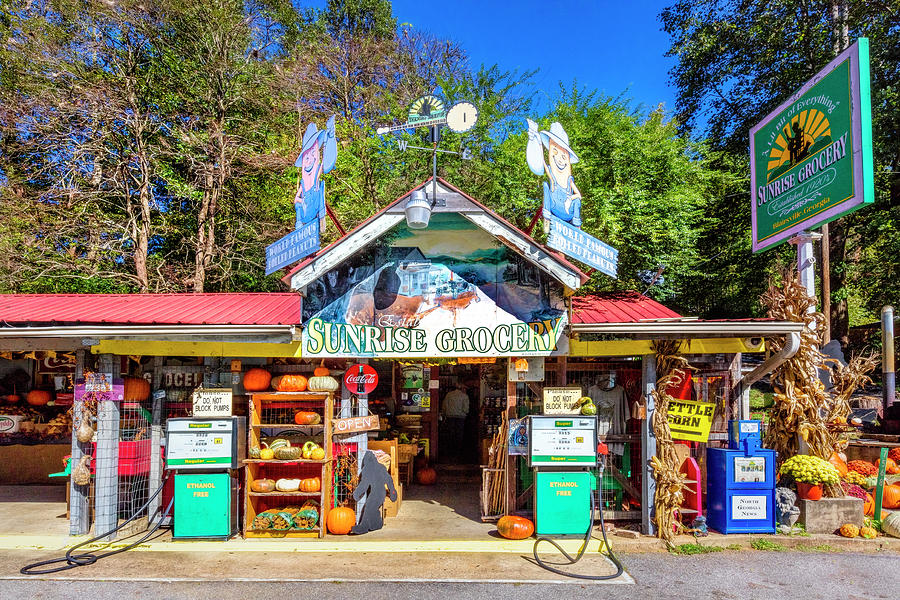 The Sunrise Grocery Photograph by Debra and Dave Vanderlaan