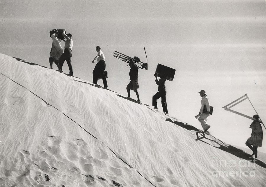 Landscape Photograph - The Technical Team Walking Up The Hill During Filming Of courrier Sud, Mogador by 