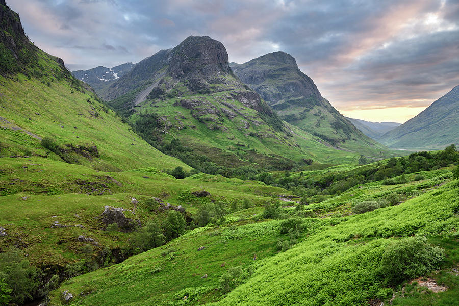 The Three Sisters peaks of Glen Coe with snow capped Bidean nam ...