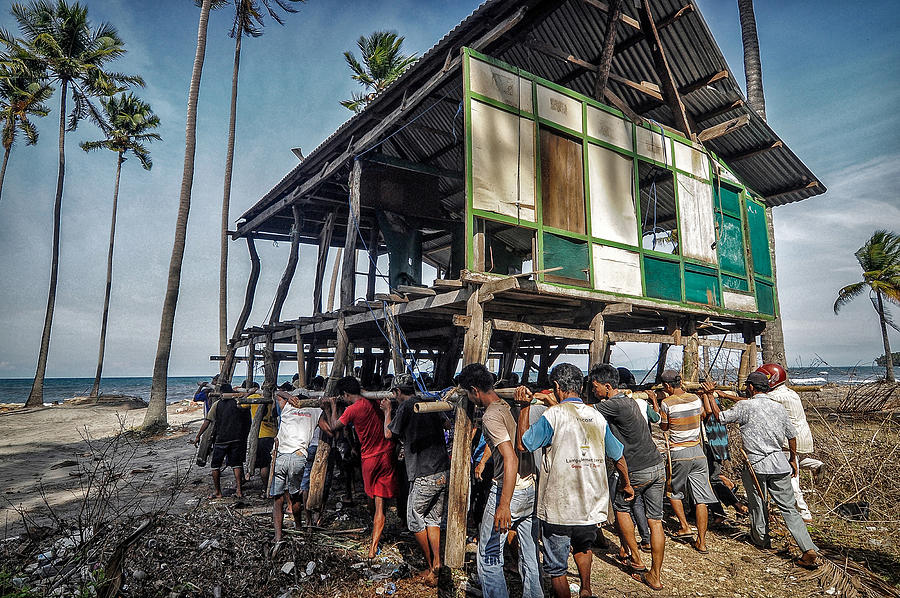 Action Photograph - The Tradition Of Moving Houses by Andinursam Action Photograph - The Tradition Of Moving Houses by Andinursam