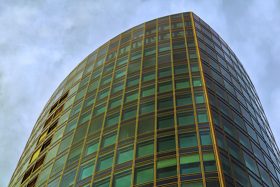 The Upper Part Of A Big Modern Office Tower Photograph by Andreas Marquardt