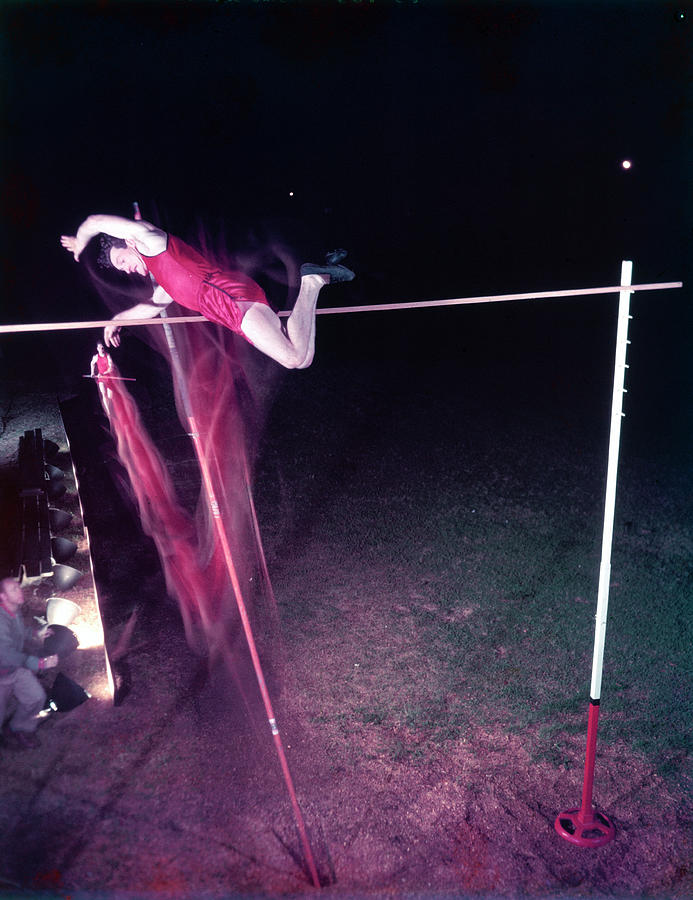 Athlete Photograph - The Vaulting Vicar In Action by J.R. Eyerman