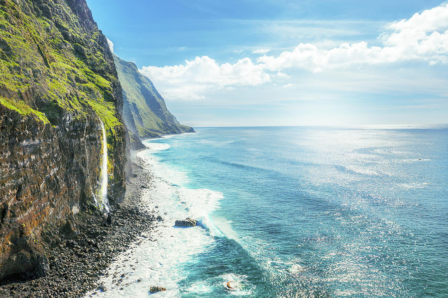 The Waterfall Flows From The Cliff To The Atlantic Ocean Photograph by Cavan Images | Fine Art