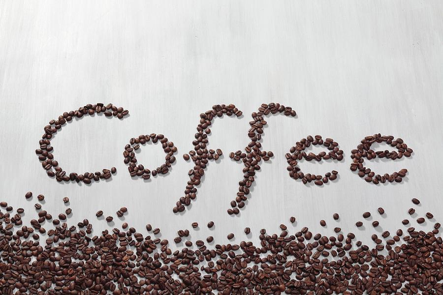The Word Coffee Written In Coffee Beans Photograph by Peter Garten