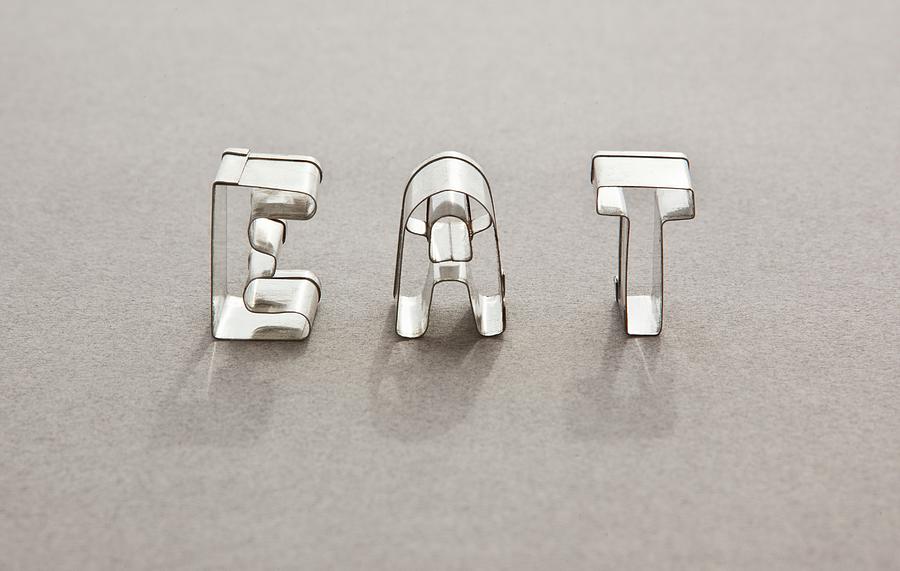 The Word Eat Made With Letter Shaped Cutters Photograph by William Boch