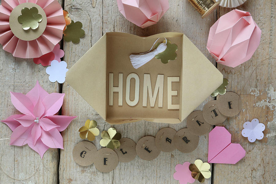 The Word home Made From Letters In Paper Box Surrounded By Handmade Paper Decorations Photograph by Regina Hippel