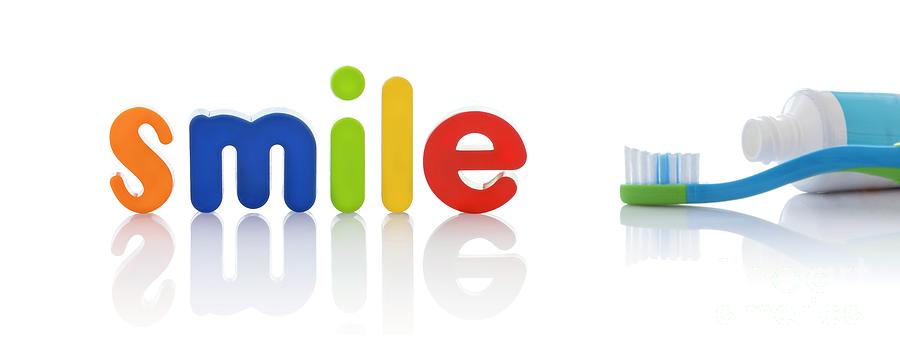 The Word smile In Multicoloured Letters With Toothbrush Photograph by Science Photo Library