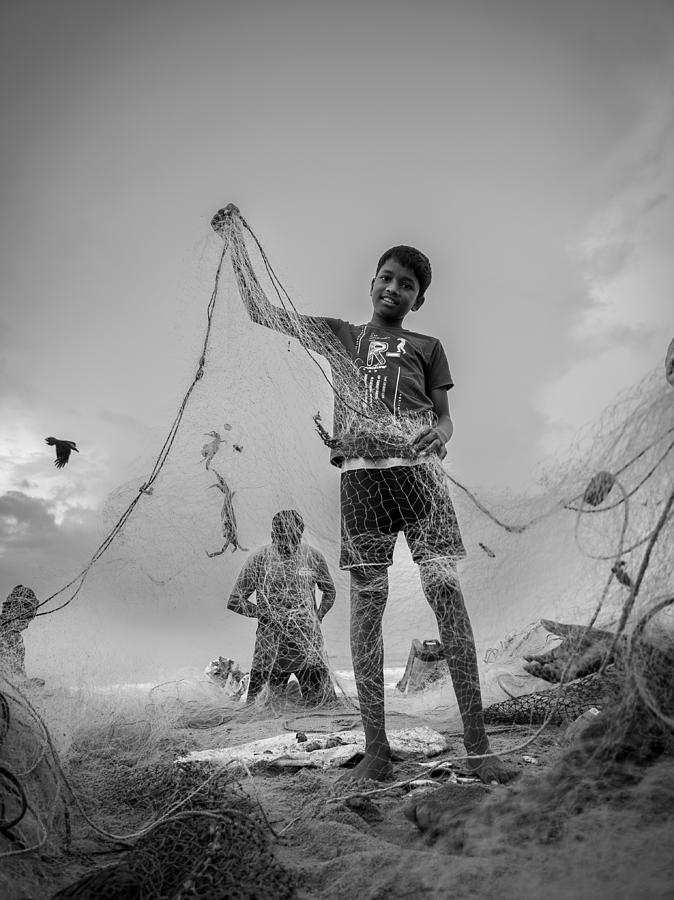 The Young Fisherman. Photograph by Sylvestre