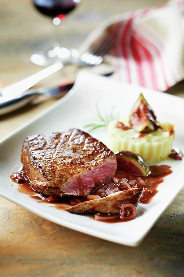 Thick Beef Steak With Fig And Kirsch Sauce Photograph by Barret - Fine ...