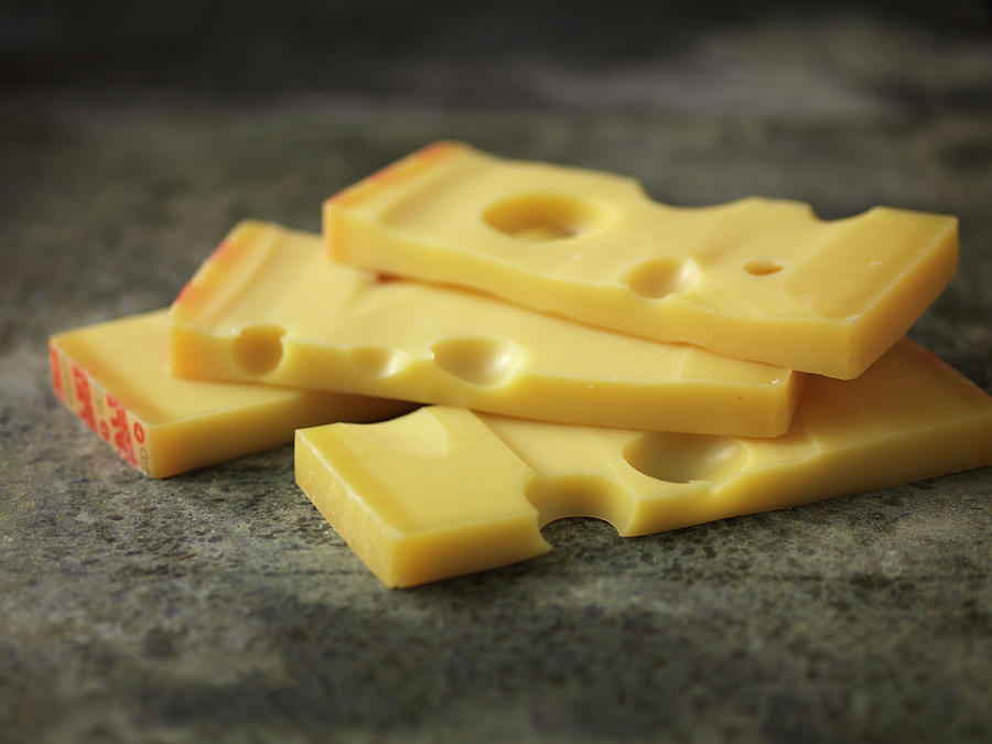 Thick Slices Of Swiss Emmental Photograph by Hugh Johnson