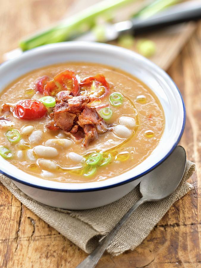 Thick White Haricot Bean And Tomato Soup With Smoked Bacon Photograph by Studio
