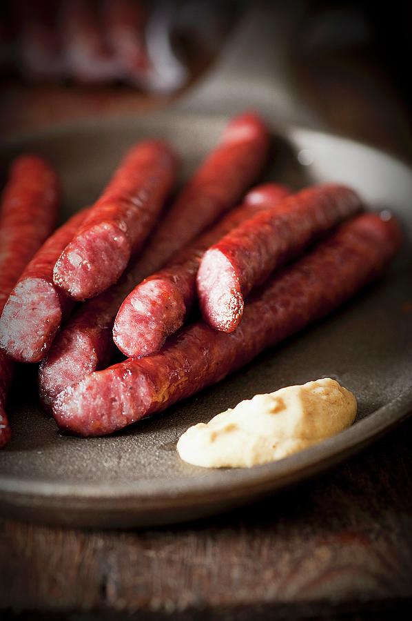 Thin Grilled Sausages With Mustard Photograph by Tomasz Jakusz
