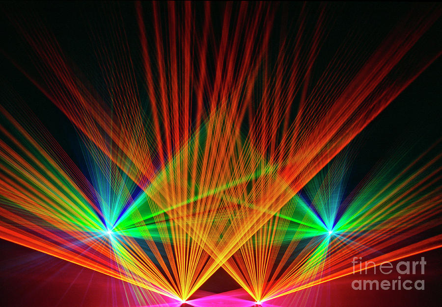 Thin, Multicoloured Laser Beams Forming A Fan Pattern - Photograph by 