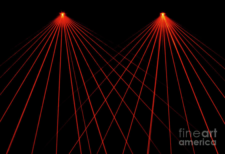 Thin, Red Laser Beams Forming A Fan Pattern - Photograph by 