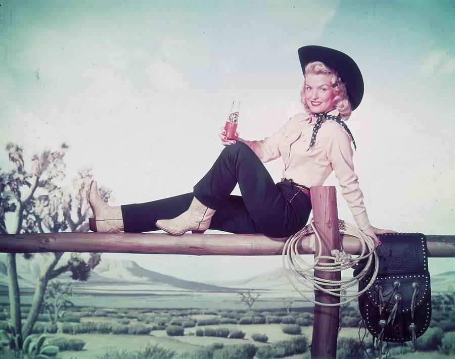 Thirsty Cowgirl Photograph by Tom Kelley Archive