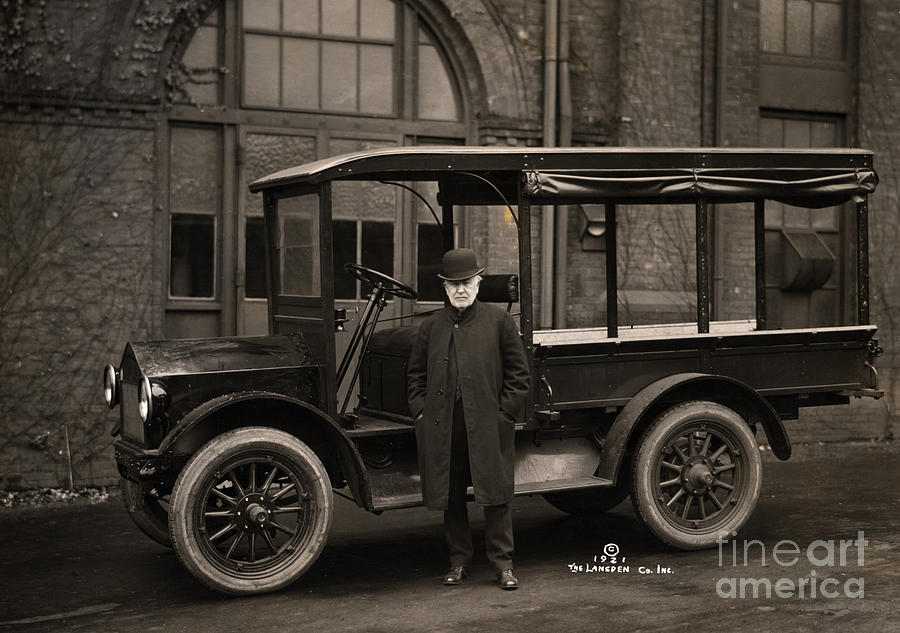 Thomas Edison Standing By Electric Car by Bettmann