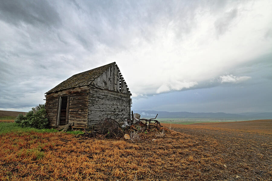 Thompson Road Cabin and Storm - Downey, Idaho Photograph by Brett Pelletier
