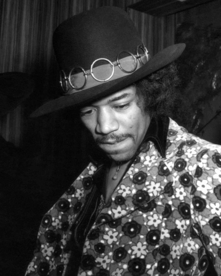 Jimi Hendrix Photograph - Thoughtful Jimi Hendrix Wearing Hat by Globe Photos