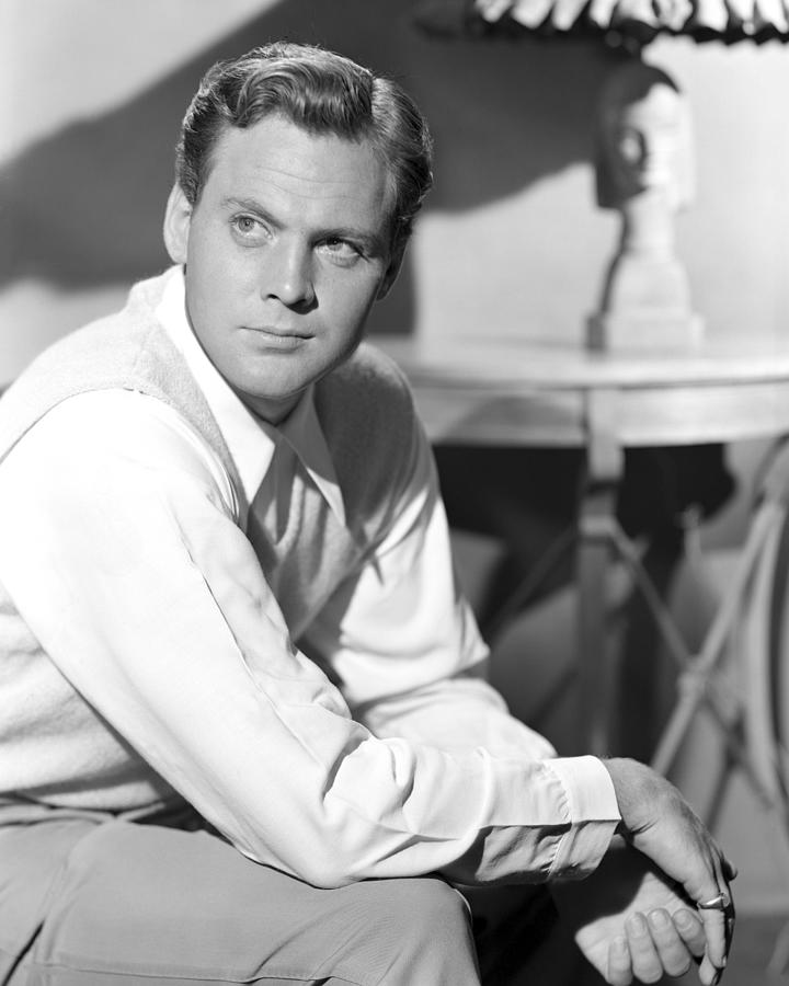 Thoughtful John Agar With Raised Eyebrow Photograph by Globe Photos ...