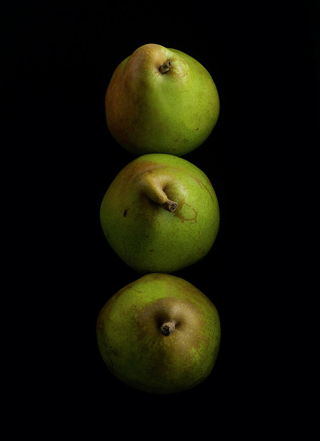 Three Anjou Pears On A Black Surface Photograph by Howard Bjornson