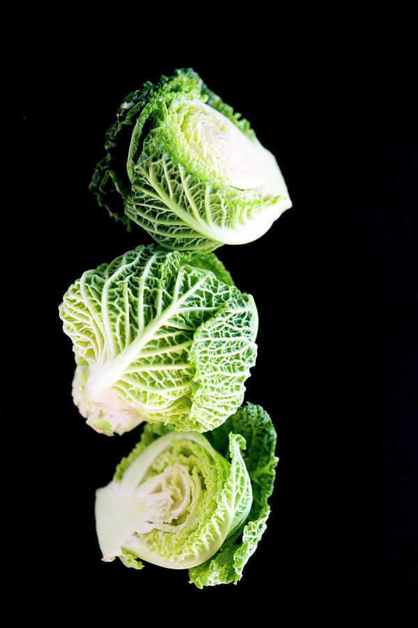 Three Baby Green Cabbages Photograph by Charity Burggraaf