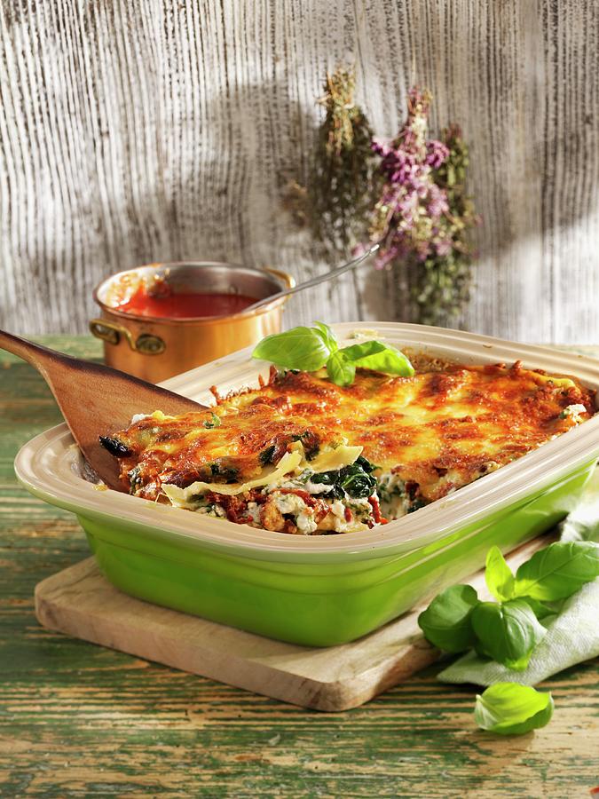Three Cheese Lasagne With Spinach Photograph by Karl Newedel