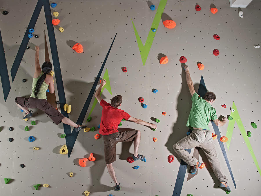 Three Climbers Bouldering At Indoor Climbing Wall In London Photograph By Cavan Images Fine