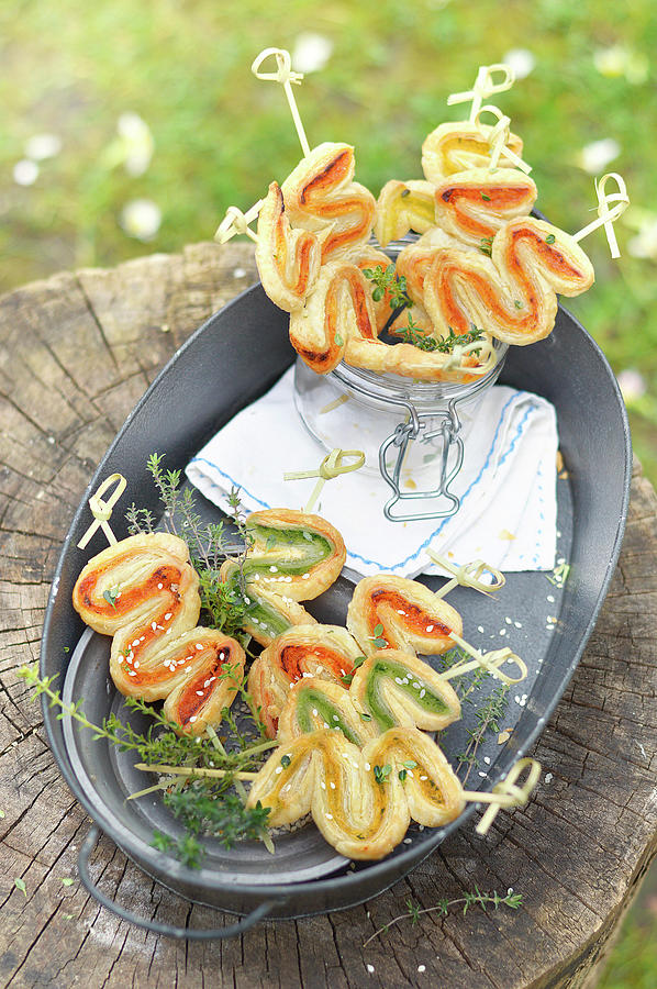 Three Colored Pesto Zigzag Puff Pastry Appetizers Outdoors Photograph by Keroudan
