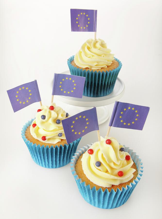 Three Cupcakes Decorated With Buttercream And Eu Flags Photograph by Foodfolio
