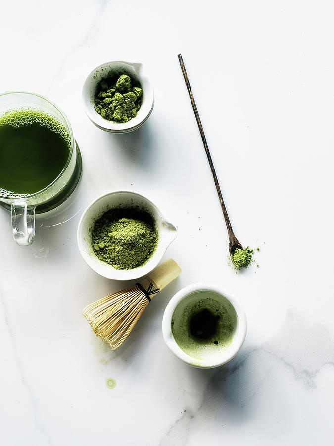 Three Cups Of Matcha Tea And Powder With Whisk Photograph by Valerie Janssen