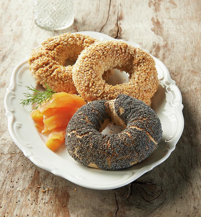 Three Different Bagels With Smoked Salmon And Dill Photograph by Brigitte Wegner