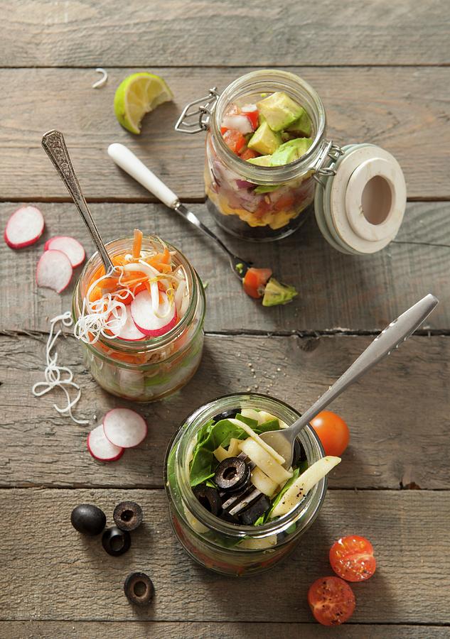 Three Different Lunch Jar Ideas With Different Fillings On A Grey Wooden Table Photograph by Stacy Grant