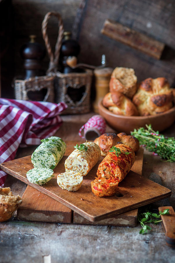 Three Different Rolls Of Herb And Spice Butter Photograph by Irina Meliukh