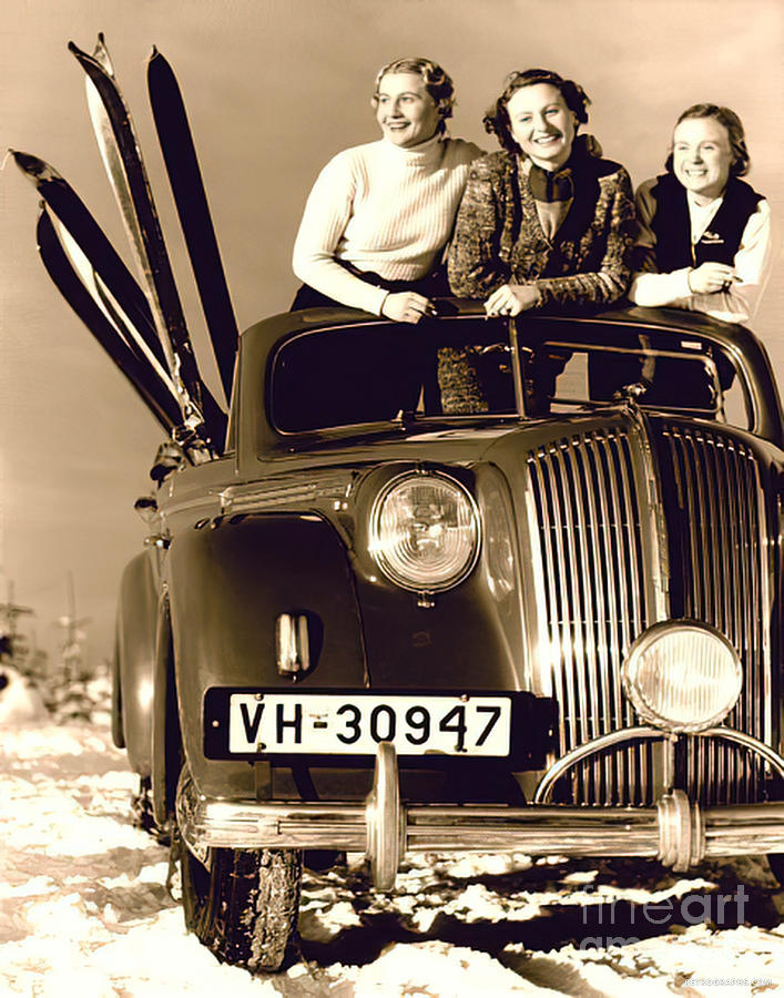 Three Fashion Models With 1940s Vehicle And Skis Photograph by Retrographs
