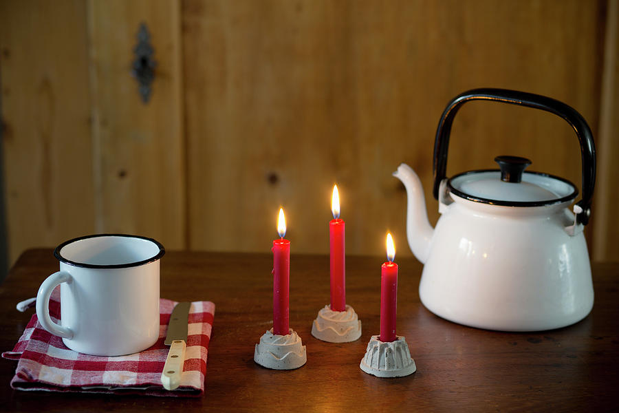 Three Lit Red Candles In Cake-shaped Candle Holders Photograph by Iris Wolf