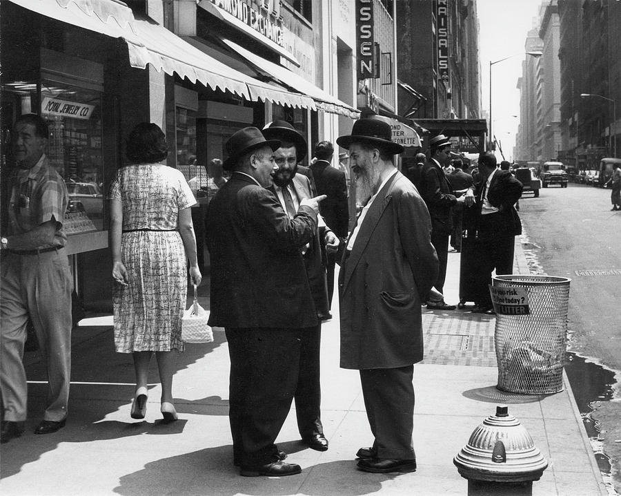 Three Men Conversing On A Sidewalk In Photograph by The New York Historical Society