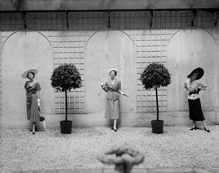 Three Models In The Vogue Paris Office Courtyard Photograph by Cecil Beaton
