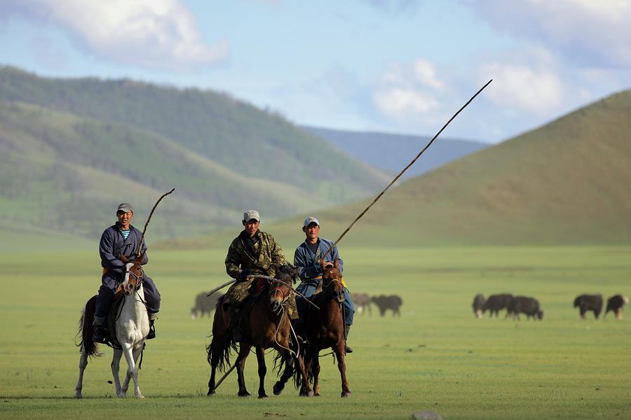 Three Nomadic Mongolian Herders On Photograph by Timothy Allen