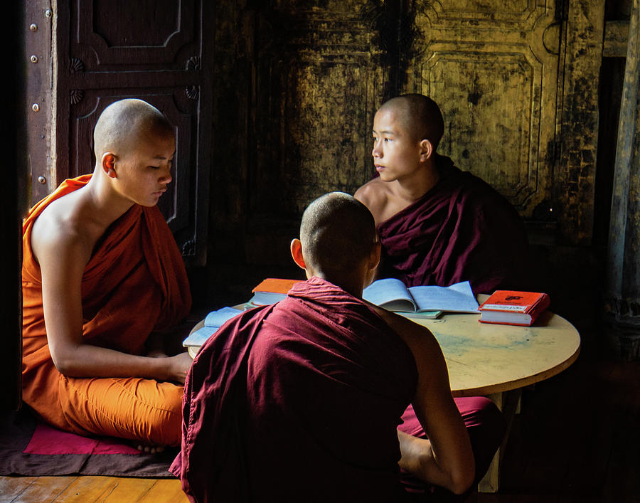 three novice monks studying at the Shwe yan pyay Monastery Photograph by Ann Moore