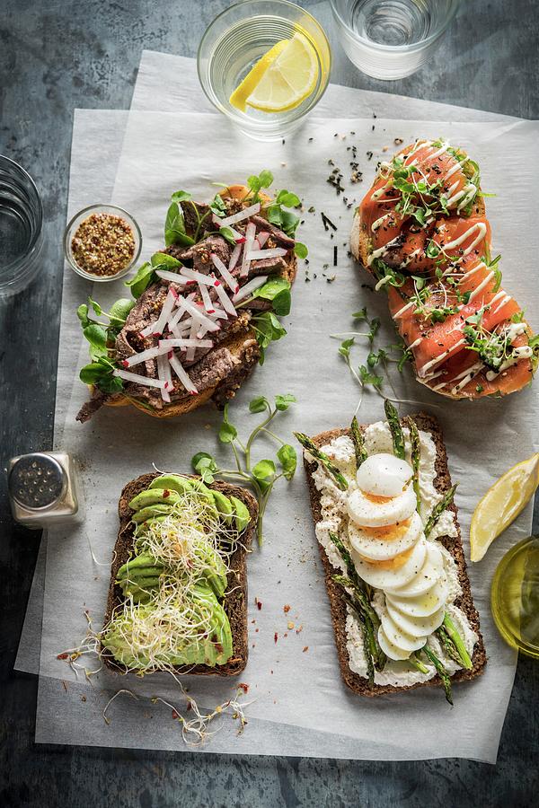 Three Open Sandwiches With Various Toppings Photograph by Malgorzata Stepien